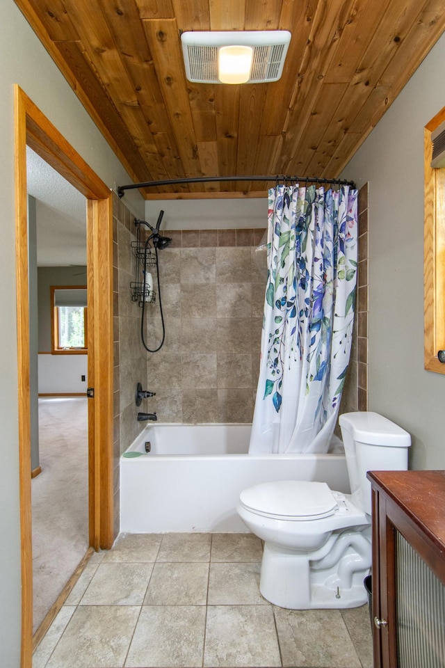 51850 Scenic Hwy Unit 7, Bigfork, MN 56628 - bathroom featuring shower / bath combination with curtain, toilet, vanity, and tile patterned floors