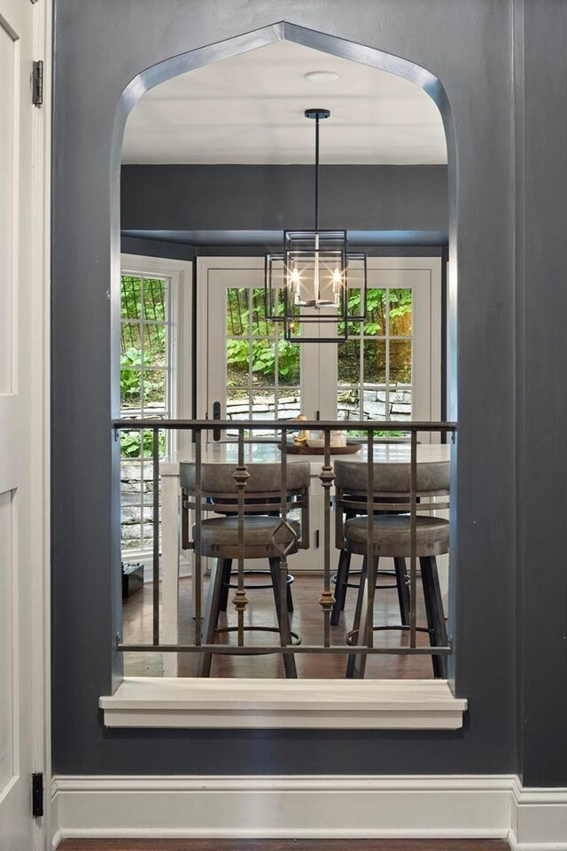 1112 Vincent Ave S, Minneapolis, MN 55405 - dining area with plenty of natural light, arched walkways, and baseboards