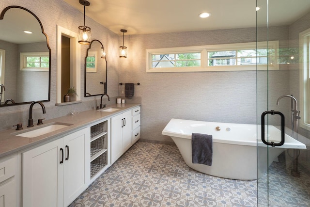 1112 Vincent Ave S, Minneapolis, MN 55405 - bathroom with double vanity, a soaking tub, tile patterned flooring, and a shower with door
