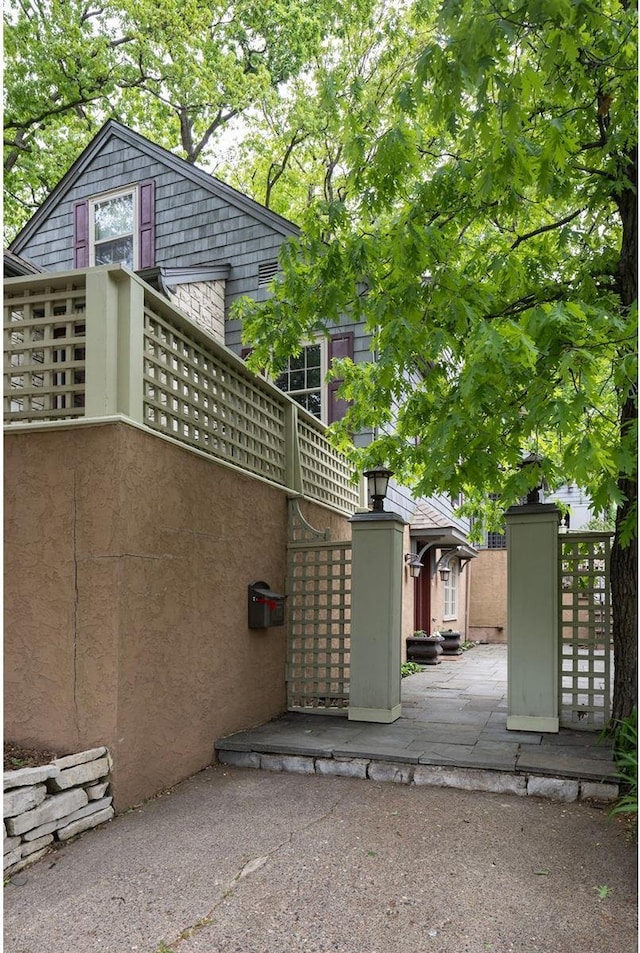 1112 Vincent Ave S, Minneapolis, MN 55405 - view of side of property with stucco siding