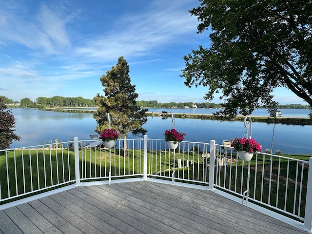 1976 Bay St, Worthington, MN 56187 - deck with a water view and a lawn