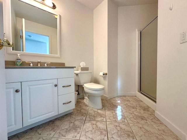 1976 Bay St, Worthington, MN 56187 - bathroom featuring vanity, a stall shower, toilet, and baseboards