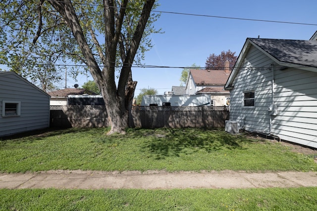 view of yard with central AC unit