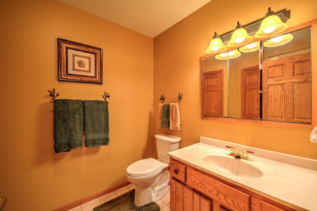 27166 Hersant Rd, Meenon Twp, WI 54893 - half bath featuring toilet, tile patterned floors, vanity, and a textured ceiling