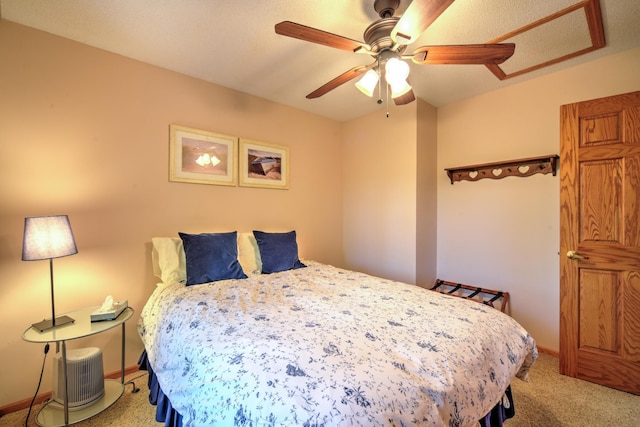 27166 Hersant Rd, Meenon Twp, WI 54893 - bedroom with light colored carpet, a ceiling fan, and baseboards