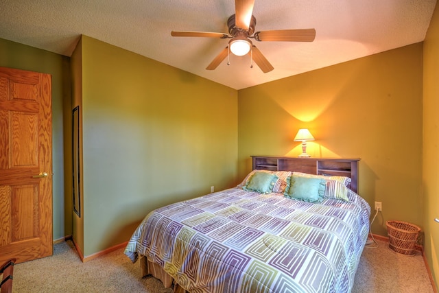 27166 Hersant Rd, Meenon Twp, WI 54893 - carpeted bedroom featuring a ceiling fan and baseboards