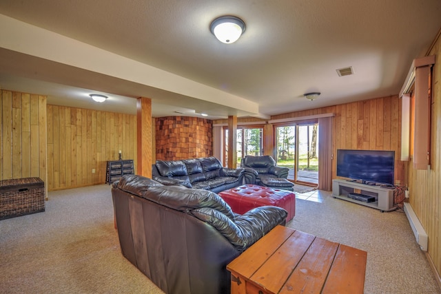 27166 Hersant Rd, Meenon Twp, WI 54893 - living room with wood walls and light colored carpet