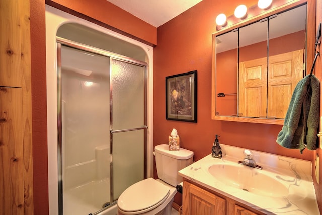 27166 Hersant Rd, Meenon Twp, WI 54893 - full bathroom featuring a shower stall, vanity, and toilet