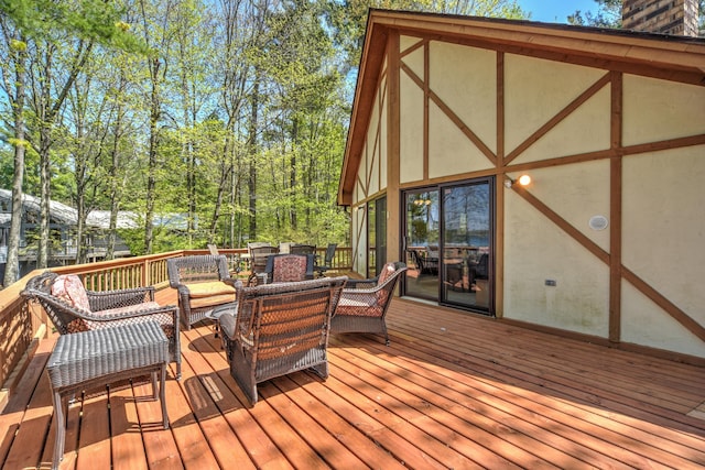 27166 Hersant Rd, Meenon Twp, WI 54893 - wooden deck with outdoor dining space and outdoor lounge area