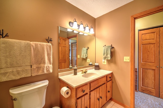 27166 Hersant Rd, Meenon Twp, WI 54893 - bathroom featuring toilet, vanity, a textured ceiling, and tile patterned floors
