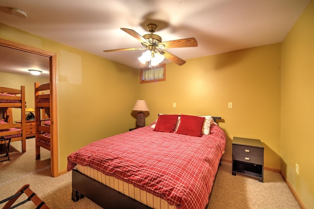 27166 Hersant Rd, Meenon Twp, WI 54893 - carpeted bedroom featuring ceiling fan and baseboards