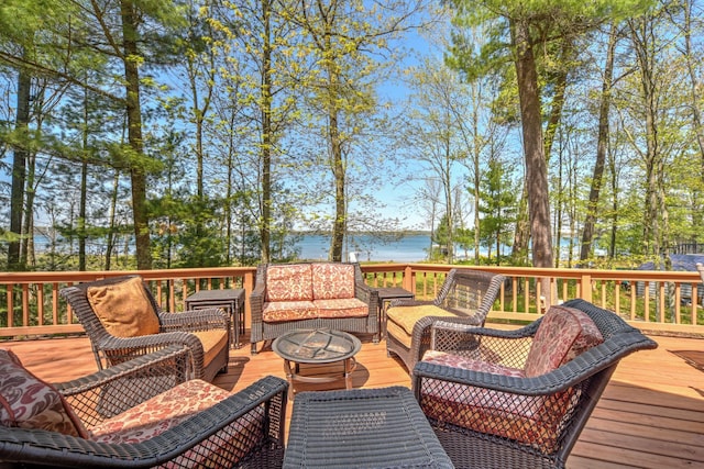 27166 Hersant Rd, Meenon Twp, WI 54893 - wooden terrace with an outdoor living space with a fire pit and a water view