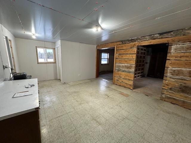 5535 Wahlsten Rd, Embarrass, MN 55732 - below grade area featuring wooden walls and light floors