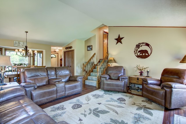 14177 205th St N, Scandia, MN 55073 - living area featuring a chandelier, vaulted ceiling, wood finished floors, and stairs