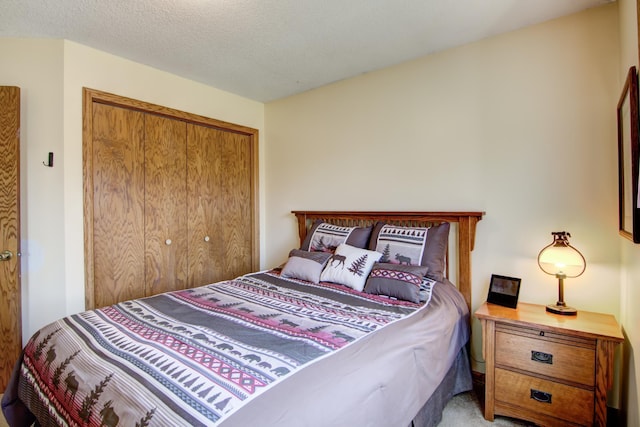 14177 205th St N, Scandia, MN 55073 - bedroom featuring a closet and a textured ceiling
