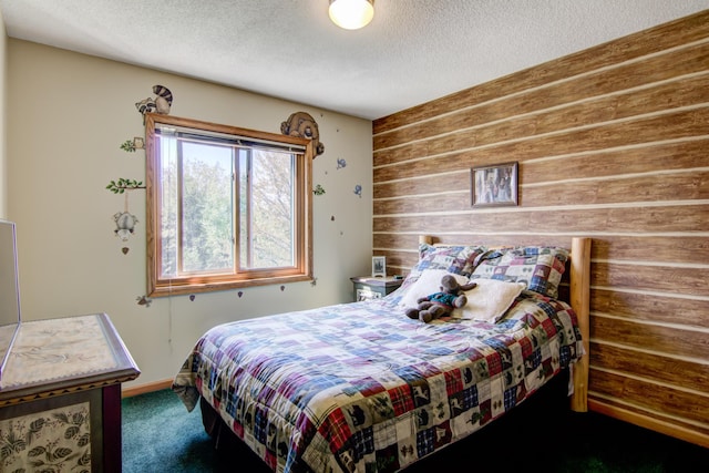 14177 205th St N, Scandia, MN 55073 - bedroom with carpet flooring, wooden walls, and a textured ceiling