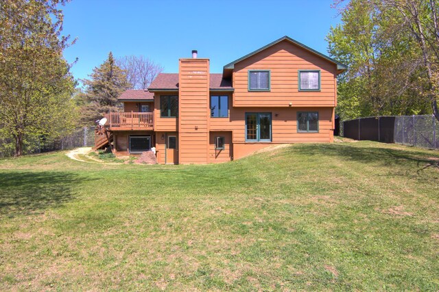 14177 205th St N, Scandia, MN 55073 - back of house with a chimney, a wooden deck, and stairs