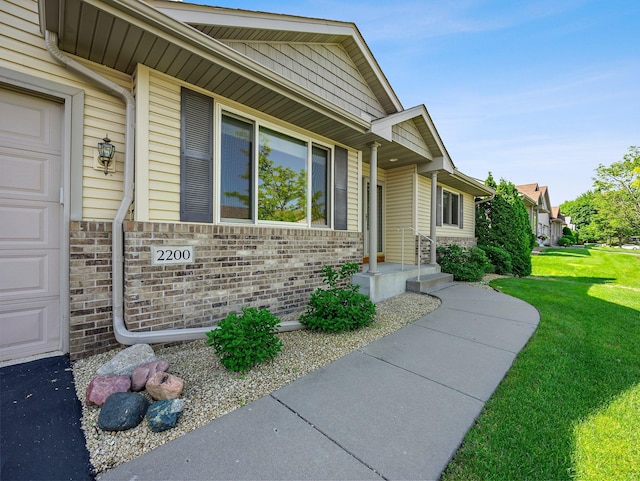 2200 142nd Ln NW, Andover, MN 55304 - entrance to property featuring a yard and brick siding