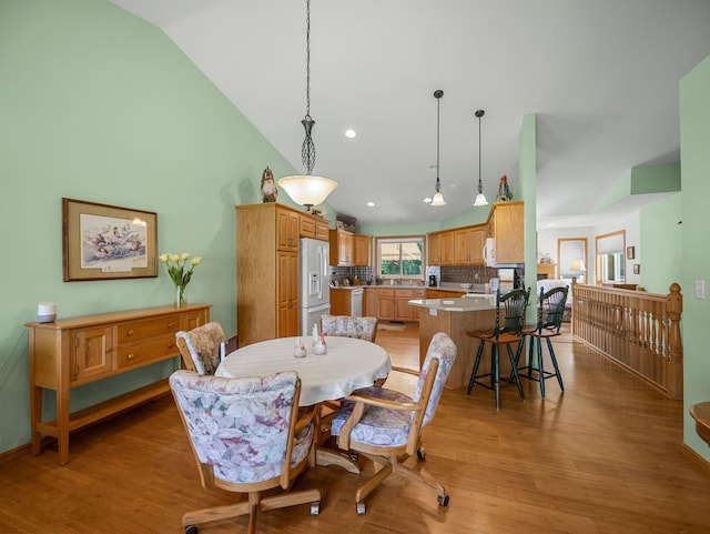 2200 142nd Ln NW, Andover, MN 55304 - dining area with lofted ceiling, light wood-style flooring, and recessed lighting