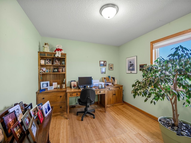 2200 142nd Ln NW, Andover, MN 55304 - office space with wood finished floors, a textured ceiling, and baseboards