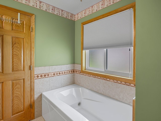 2200 142nd Ln NW, Andover, MN 55304 - full bath featuring a tub with jets and a wainscoted wall