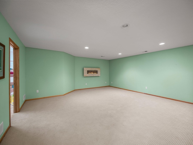 2200 142nd Ln NW, Andover, MN 55304 - unfurnished room featuring light colored carpet, baseboards, and recessed lighting