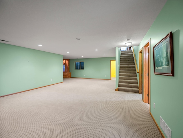 2200 142nd Ln NW, Andover, MN 55304 - finished basement with light carpet, stairway, and recessed lighting