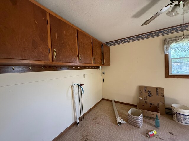 408 Jefferson St, Minneota, MN 56264 - washroom with cabinet space, a ceiling fan, hookup for a washing machine, and baseboards