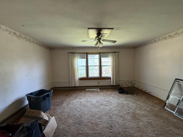 408 Jefferson St, Minneota, MN 56264 - carpeted empty room featuring ceiling fan