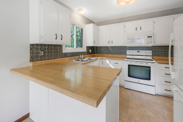 805 3rd Ave N, Sartell, MN 56377 - kitchen featuring white appliances, backsplash, a peninsula, and a sink