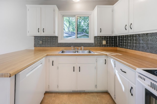 805 3rd Ave N, Sartell, MN 56377 - kitchen featuring white dishwasher, a sink, light countertops, and decorative backsplash
