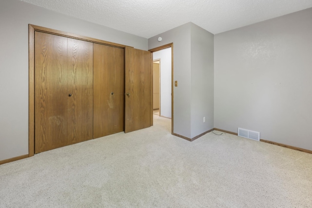 805 3rd Ave N, Sartell, MN 56377 - unfurnished bedroom featuring carpet, a closet, and baseboards