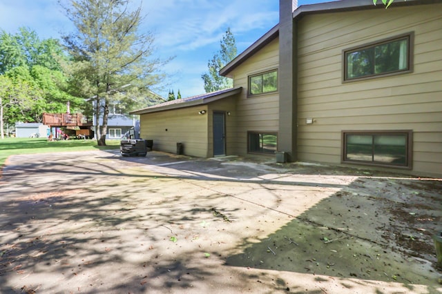 805 3rd Ave N, Sartell, MN 56377 - back of house featuring a chimney