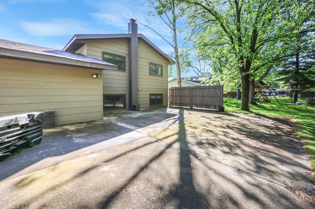 805 3rd Ave N, Sartell, MN 56377 - view of side of property with a chimney