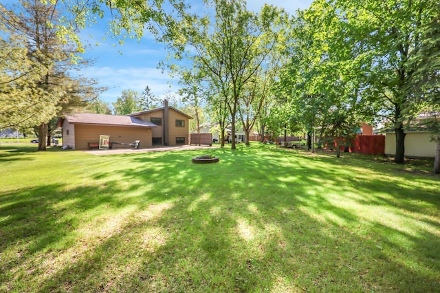 805 3rd Ave N, Sartell, MN 56377 - view of yard with an outdoor fire pit and a patio
