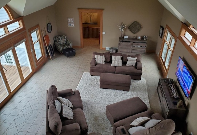 28571 Buffalo Lake Rd, Richwood Twp, MN 56521 - living area with tile patterned floors, plenty of natural light, and vaulted ceiling