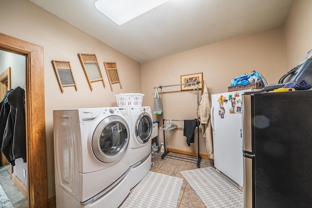 28571 Buffalo Lake Rd, Richwood Twp, MN 56521 - clothes washing area with washing machine and clothes dryer and tile patterned flooring