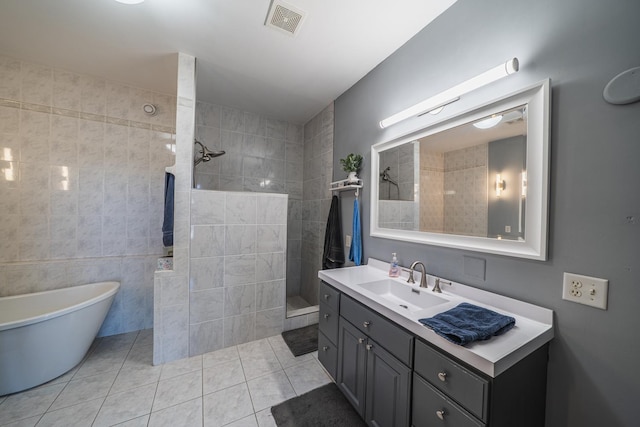 28571 Buffalo Lake Rd, Richwood Twp, MN 56521 - full bathroom with walk in shower, vanity, tile patterned flooring, a freestanding bath, and tile walls