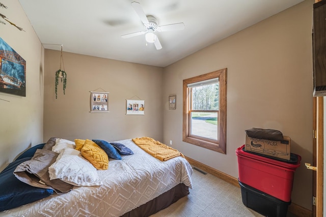28571 Buffalo Lake Rd, Richwood Twp, MN 56521 - carpeted bedroom featuring a ceiling fan and baseboards