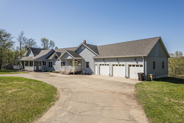 28571 Buffalo Lake Rd, Richwood Twp, MN 56521 - view of front of property with a porch, driveway, a front yard, and a chimney