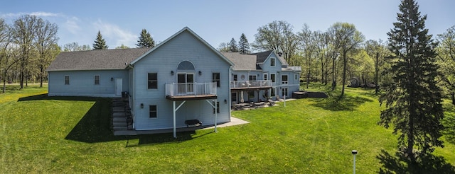 28571 Buffalo Lake Rd, Richwood Twp, MN 56521 - rear view of house with a lawn and a deck