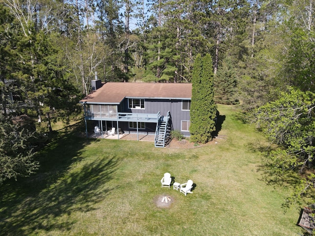 10415 Sorenson Dr, Hayward, WI 54843 - view from above of property with a heavily wooded area