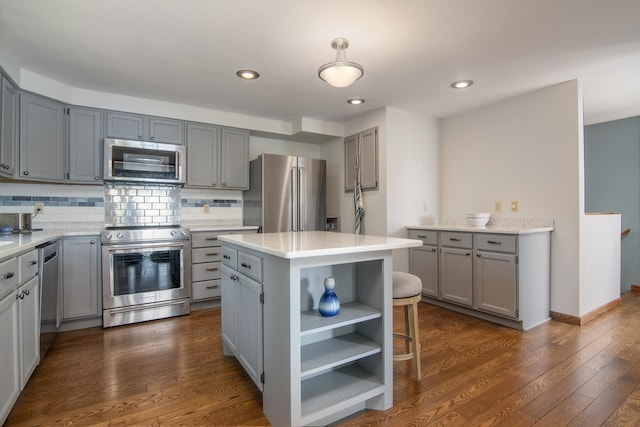 10415 Sorenson Dr, Hayward, WI 54843 - kitchen with appliances with stainless steel finishes, gray cabinetry, open shelves, and recessed lighting