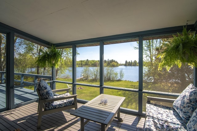 10415 Sorenson Dr, Hayward, WI 54843 - sunroom featuring a water view, healthy amount of natural light, and view of wooded area