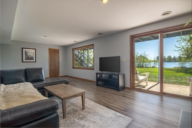 10415 Sorenson Dr, Hayward, WI 54843 - living room with baseboards and wood finished floors