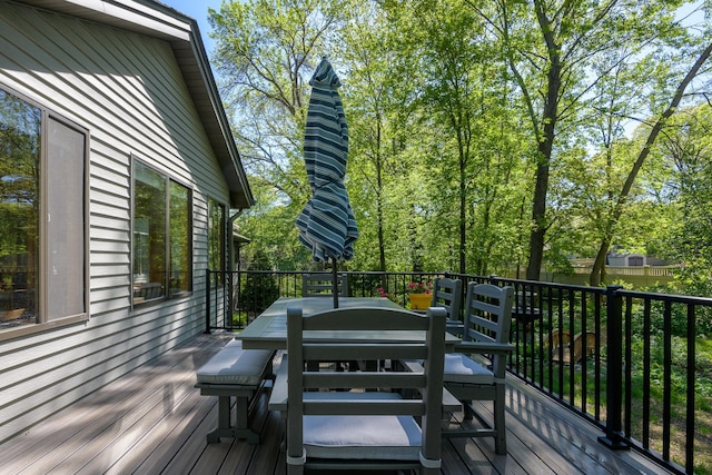 514 10th St N, Sartell, MN 56377 - wooden deck with outdoor dining space