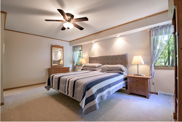 514 10th St N, Sartell, MN 56377 - bedroom with light carpet, crown molding, baseboards, and a ceiling fan
