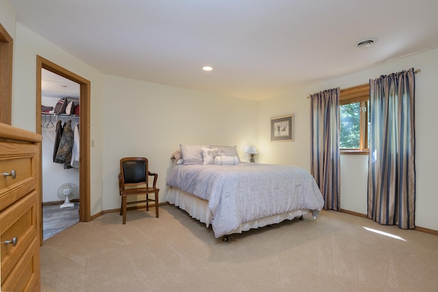 514 10th St N, Sartell, MN 56377 - bedroom with light carpet, baseboards, recessed lighting, and a closet