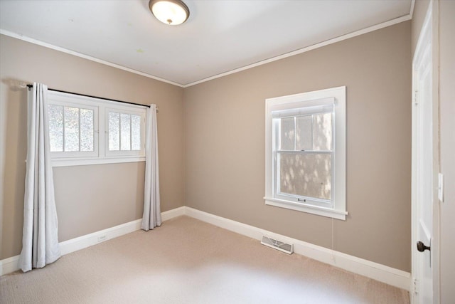 4505 47th Ave S, Minneapolis, MN 55406 - carpeted spare room with ornamental molding and baseboards