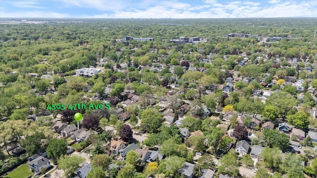 4505 47th Ave S, Minneapolis, MN 55406 - drone / aerial view of a heavily wooded area